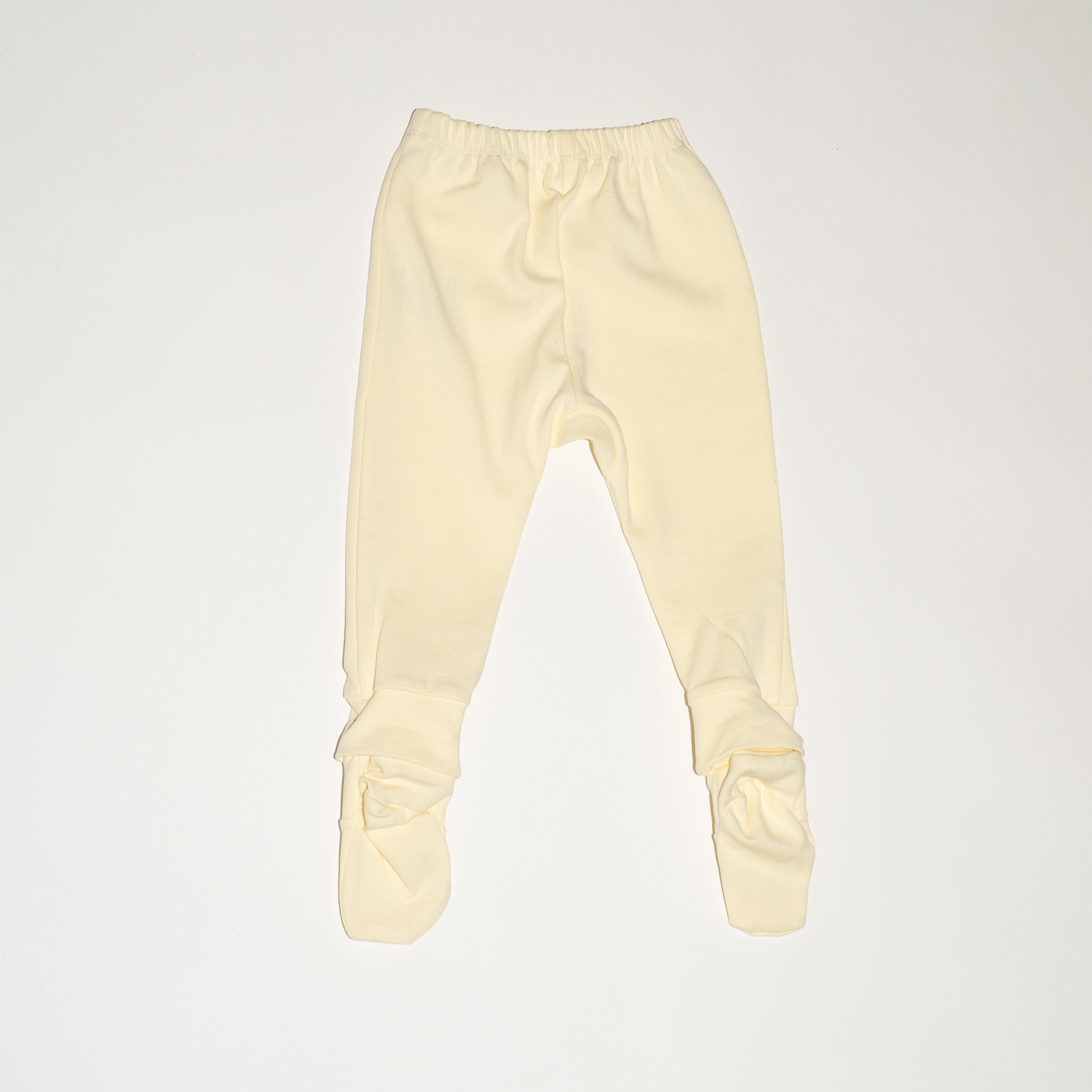 de achterkant van de modulaire legging in butter yellow van besito baby