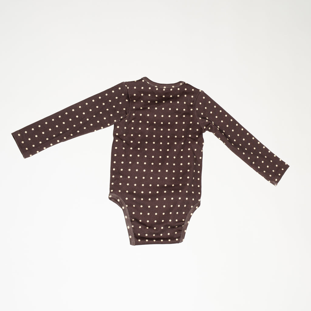 de achterkant van de wap bodysuit in polka dot van besito baby