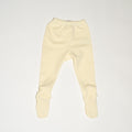 de voorkant van de modular legging van besito baby in butter yellow