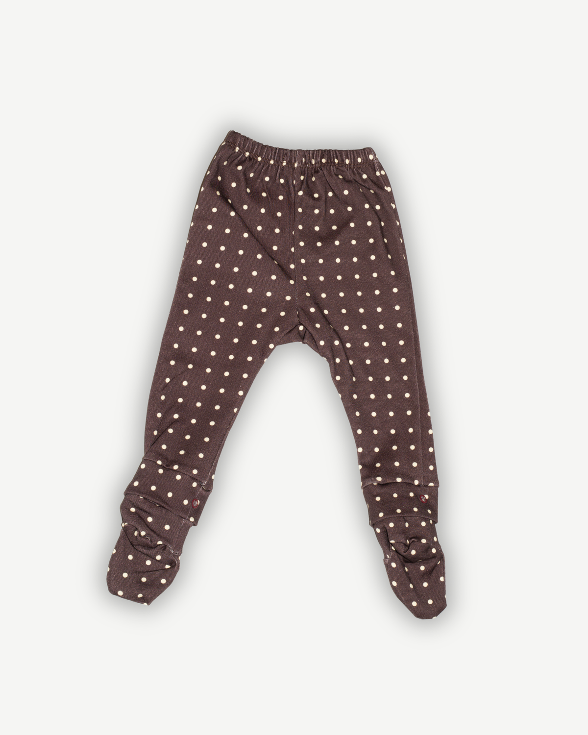 de voorkant van de polka dot legging van besito baby baby legging met afneembare sokjes