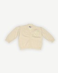 de voorkant van het merino wollen vestje in butter yellow